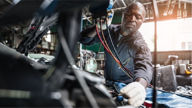 man working on a car