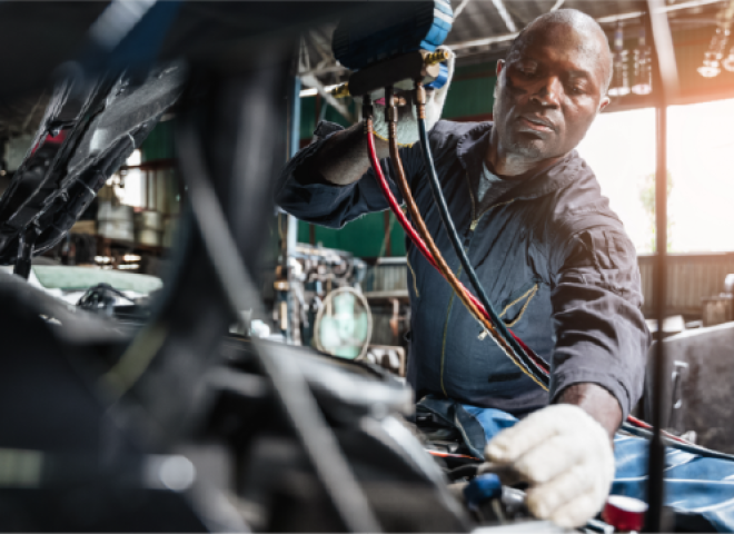 man working on a car