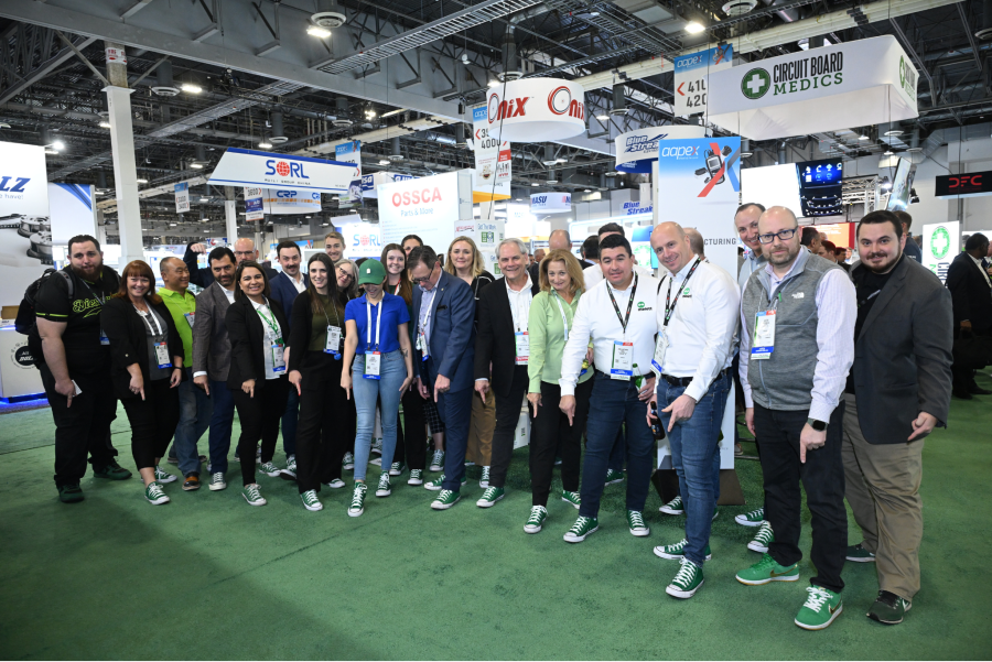 AAPEX Attendees in Green "Chucks" to highlight Remanufacturing
